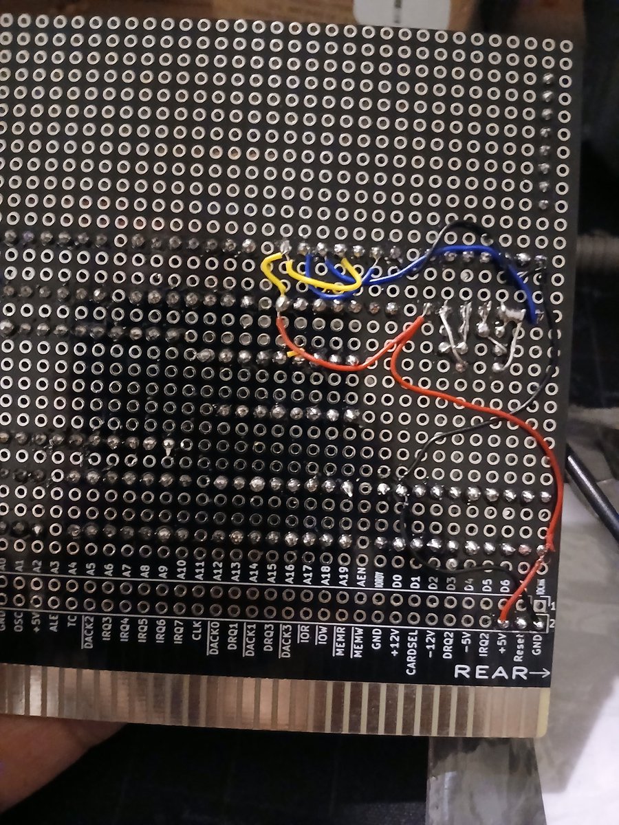 nanochess's tweet image. The sockets are now soldered. I decided to start with the oscillator, and I made one with a 10mhz crystal and divided with 74LS74. The capacitor between inverters was 10pf so it failed, it must be 0.1uf. I&apos;m pretty happy to have the required 5 mhz. #retro #transputer
