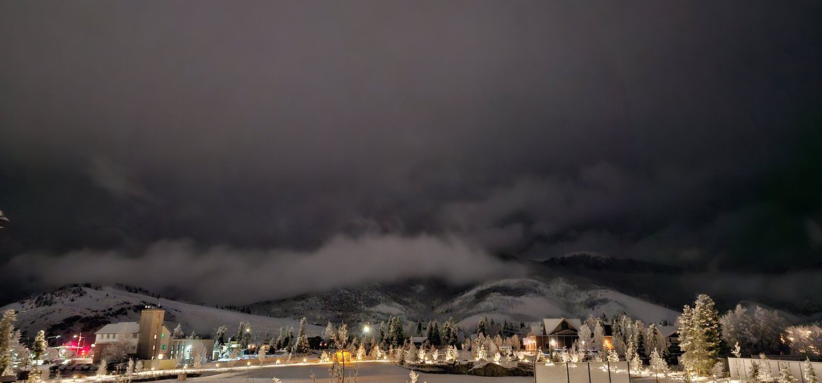 May 1, 12:09 a.m. MDT, looking east from Dillon, CO, after a spring snowfall. Cellphone vs. human eye. The horizontal cloud band/newly snowcovered mountains were invisible to the naked eye, as was most of the detail(s) in the foreground. [Best viewed landscape, full-screen.]#cowx