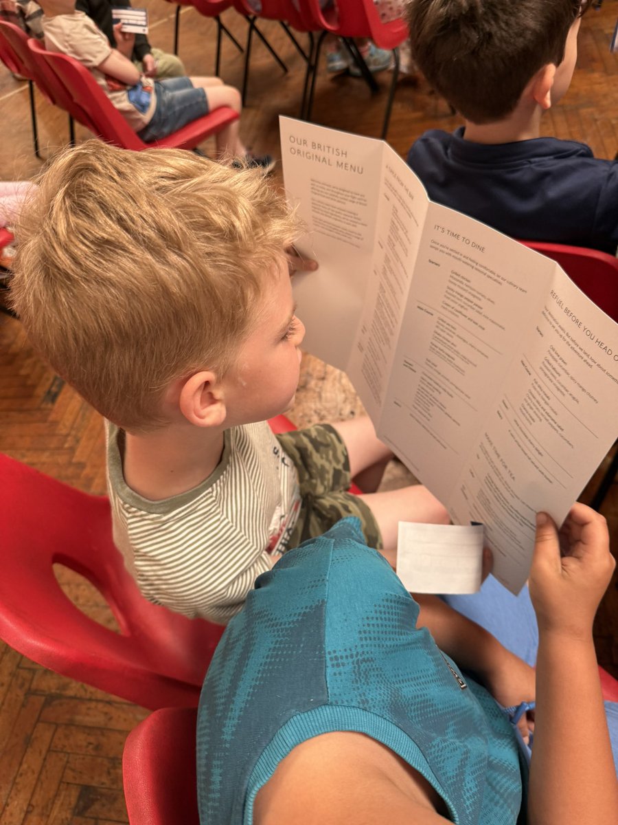 ClaphamTerrace1's tweet photo. Year 2 are ready to fly to India this morning! We are just browsing the menu! #Pilot #India #TopicDay https://t.co/Sg6XTicPjn