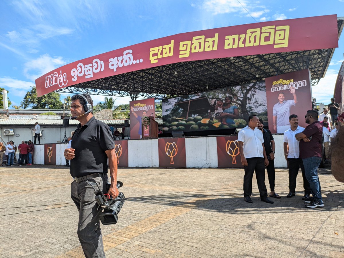 At the 'Ravatilla ivasuva athi, Dan ithin nagitimu' (Enough tolerating the deceit, let's rise up) Sri Lanka Podujana Peramuna May Day Rally 2025. Initial commentary very anti-NPP, reminding of 87-88 JVP terror, while anti-NPP discourse last year's May Day rally much more muted.