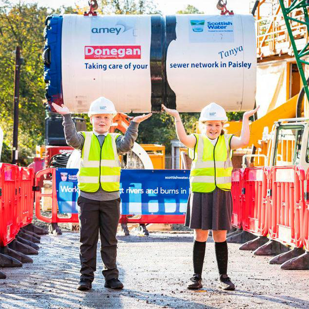 DoneganCivils's tweet photo. #ThrowbackThursday to 2018 when our team delivered the Paisley Transfer Sewer with @Amey &amp; @scottish_water. 1.4km of tunnel, tough ground, multiple breakthroughs, &amp; great community moments - like welcoming “Tunnelling Tanya”!

#Tunnelling #Infrastructure #Paisley https://t.co/x6WN89vlvX