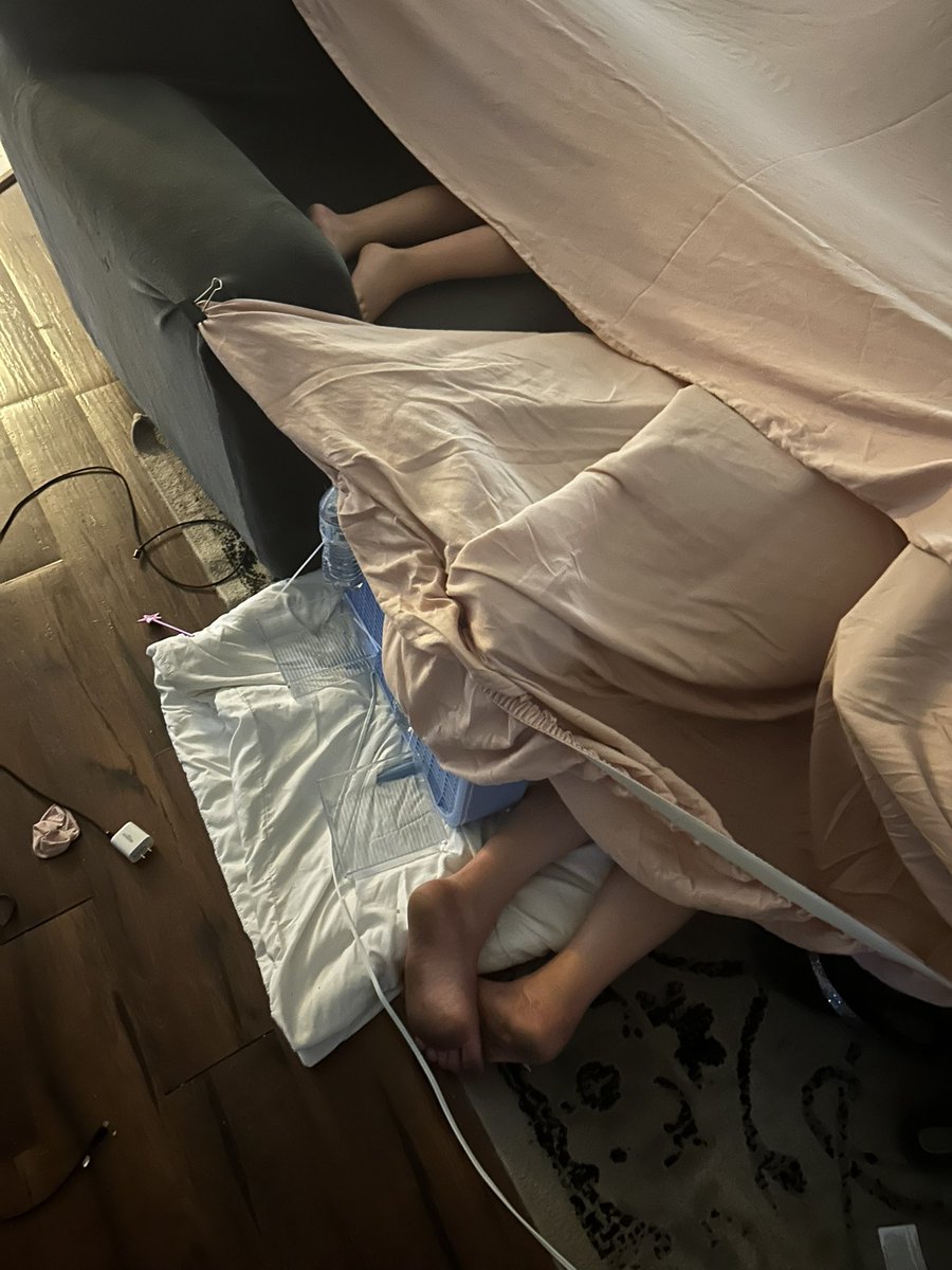 Our AC went out yesterday. Woke up this morning. See this in the living room. <a href="/missyncj/">HotMama4Eva💁‍♀️❤️🎶🥰</a> made a tent with a fan it. Her and Lawrence’s little dirty feet poking out. 🤣🤣🤣🤣🤣🤣