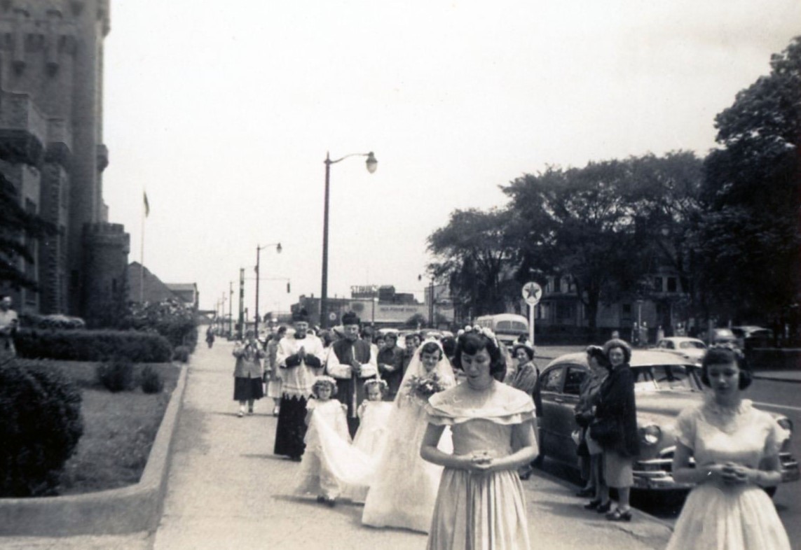 #ThrowbackThursday to St. Agnes High School students processing on East Main Street during the school's 1952 May Day observance. Rochester's Main Street Armory building is visible on the left. #tbt #mayday