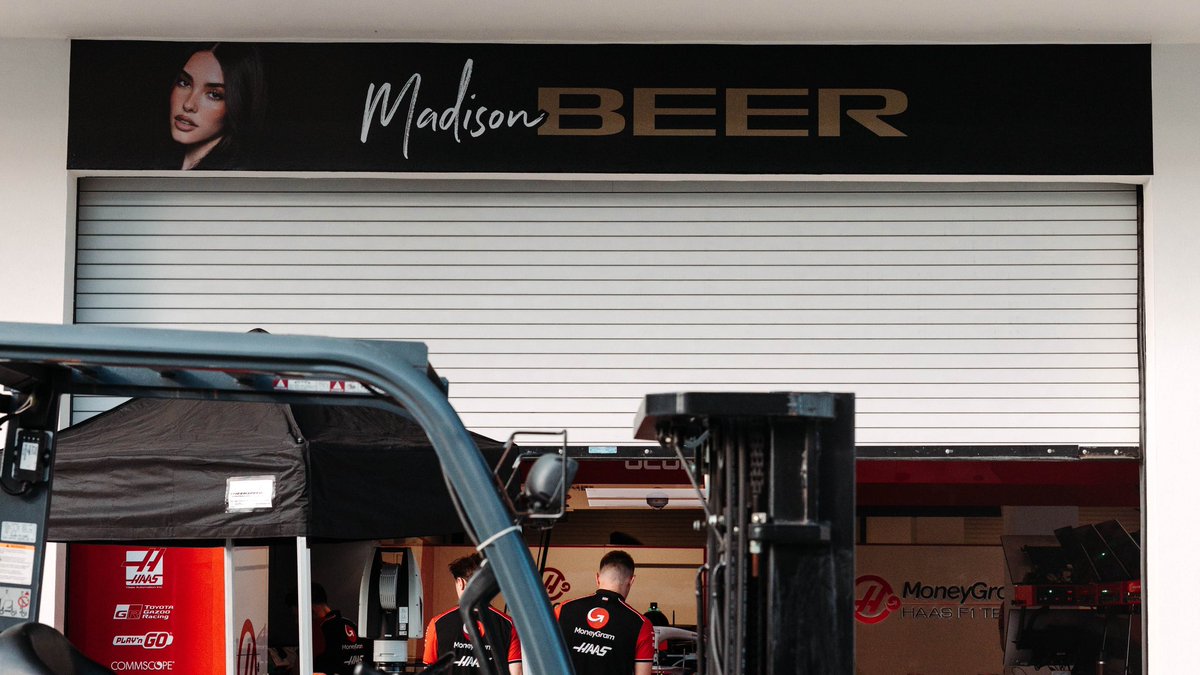 📸 <a href="/madisonbeer/">madison beer</a> is the banner for the Haas pit lane garage in Miami