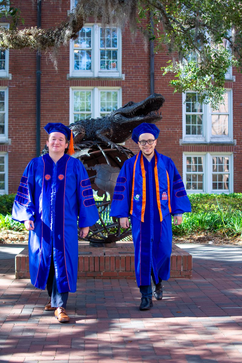 UFEconomics's tweet photo. We’re proud to celebrate our Ph.D. graduates @Lille_Gonzalez and @ikap1307, who crossed the stage at today’s UF Doctoral Commencement Ceremony! #PhinallyDone #UFGrad #GatorNation #500kGators https://t.co/S597Bb4yWr