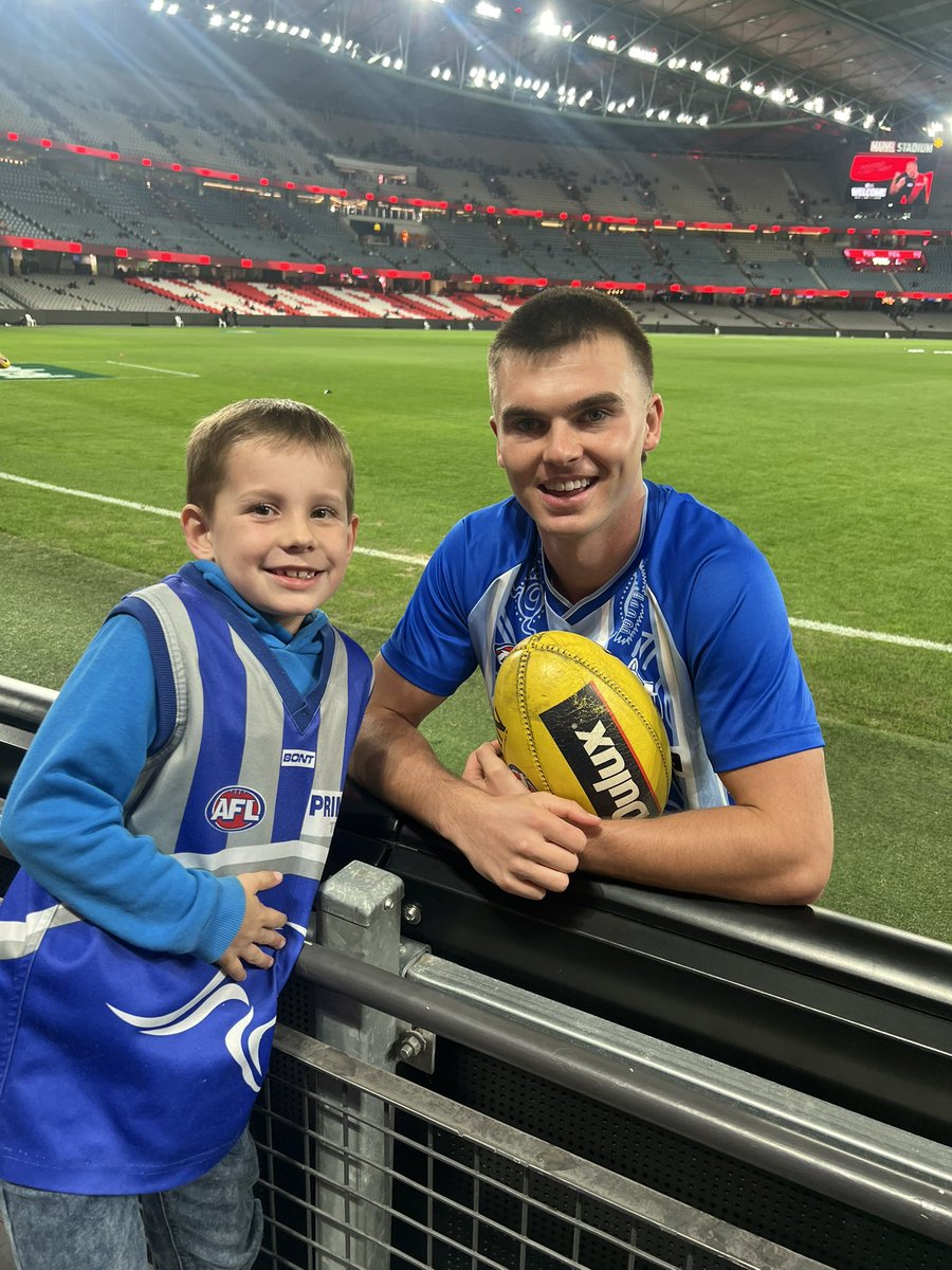 Trav789's tweet photo. Some pretty special moments for Thomas last night. Might not have been the result we wanted but these players know how to make this boys night! 
It’s the little things that count! 💙🤍
@NMFCOfficial #afl #AFLDonsNorth #kangas https://t.co/ayQ6HPMfk6