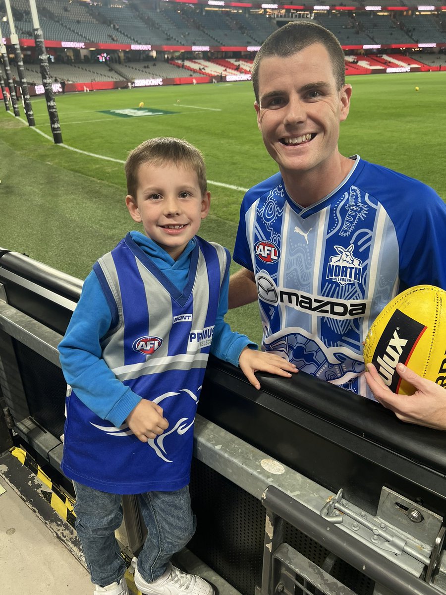 Trav789's tweet photo. Some pretty special moments for Thomas last night. Might not have been the result we wanted but these players know how to make this boys night! 
It’s the little things that count! 💙🤍
@NMFCOfficial #afl #AFLDonsNorth #kangas https://t.co/ayQ6HPMfk6