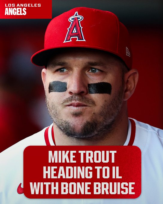 Mike Trout Heading to IL With Bone Bruise
Los Angeles Angels
Pictured: Mike Trout wears a white Angels uniform with red lettering and a red Angels cap.