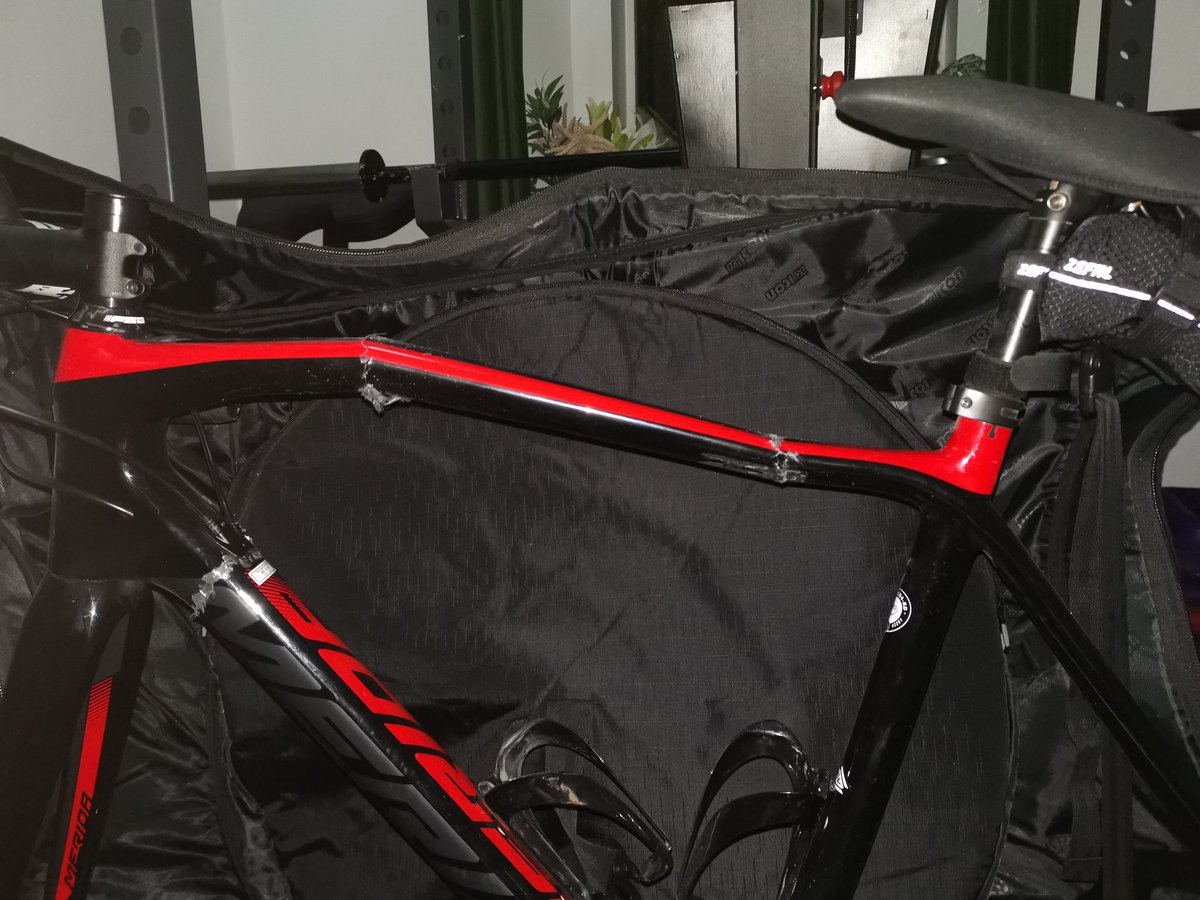 Thomson_32's tweet photo. @SimonCalder flying with @Ryanair with my bike in a @sciconsports bag. My bike was smashed to bits, Ryanair say they aren't liable as I never checked it before leaving baggage claim. The bag was visibly ok so I only noticed when I opened it at home. Where do I stand? https://t.co/HKWcIvJ5Ud