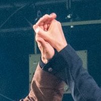 hugh's smaller hand trying to hold mads's ok