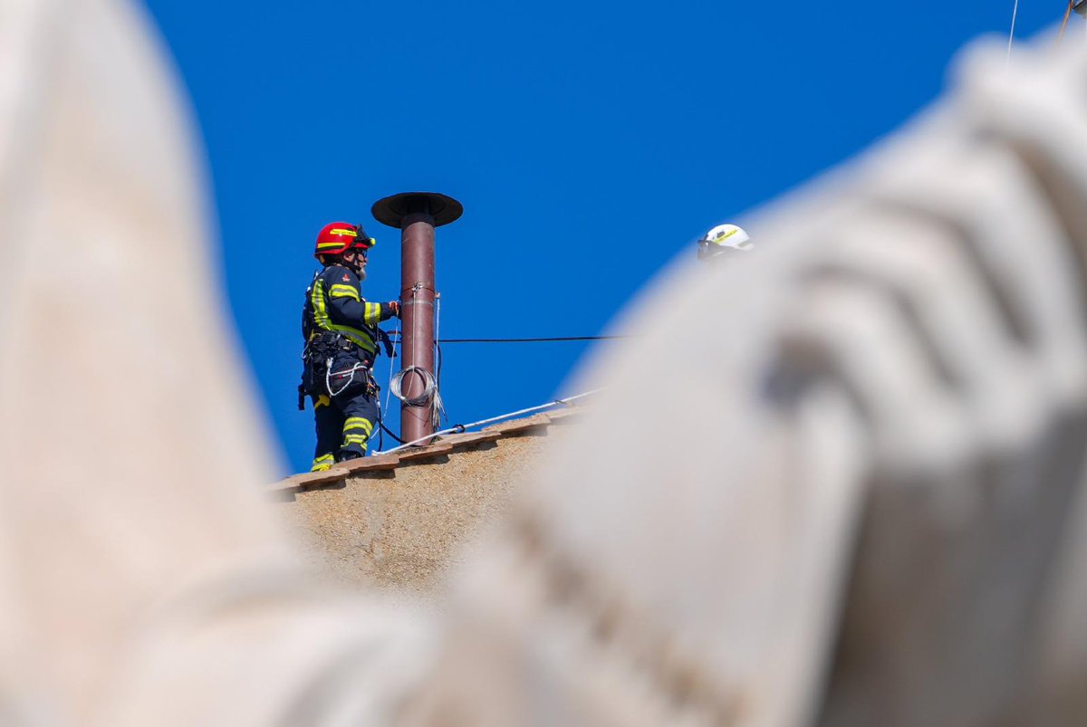 Ready for smoke signals. Vatican workers put the chimney on the roof of the Sistine Chapel today. Connected to the stove where the ballots will be burned during the conclave to elect a new pope, the chimney will signal when a new pope has been elected. (📸<a href="/LolaGomezC/">Lola Gomez</a>)