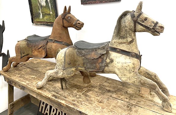 AntiqueDigest's tweet image. At the Lebanon Antique show: 2 figures from a flying-horse carousel having 16 horses and 2 chariots, being sold as a complete unit for $26,000 by Seth Bixel. It was made by the United States Merry-Go-Round Company maineantiquedigest.com/stories/the-20… #antiques #carousel #merrygoround #horses