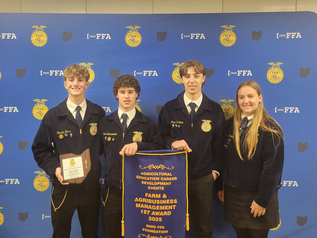 The State Champion Farm &amp; Agribusiness Management received their banner on stage at the Ohio FFA State Convention.