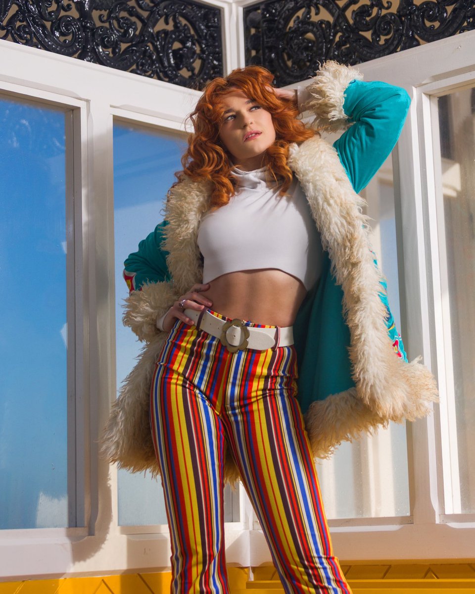 I woke up inside a kaleidoscope and punched my way out. The sky blinked first.