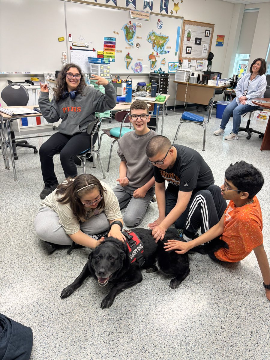 Lots of fun at Hills today! Visiting poet Amanda Crane to close out poetry month with students and #Thorthetherapydog interacting with lots of students!