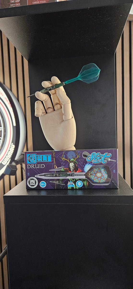 Ridicule_delete's tweet photo. @Shot_Darts retired my first set of @Shot_Darts but couldn't let them go completely, now on display in the darts room mimicking my grip. https://t.co/AaDjf2DwpC