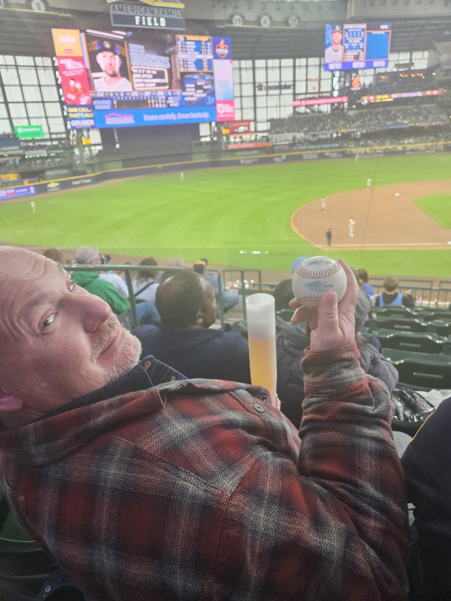 Jurassic_Mitch's tweet photo. My dad caught the first pitch of @loganbh2 that was hit fowl during the @Brewers Easter game. What a fun treat! https://t.co/VDeHMwDo3T