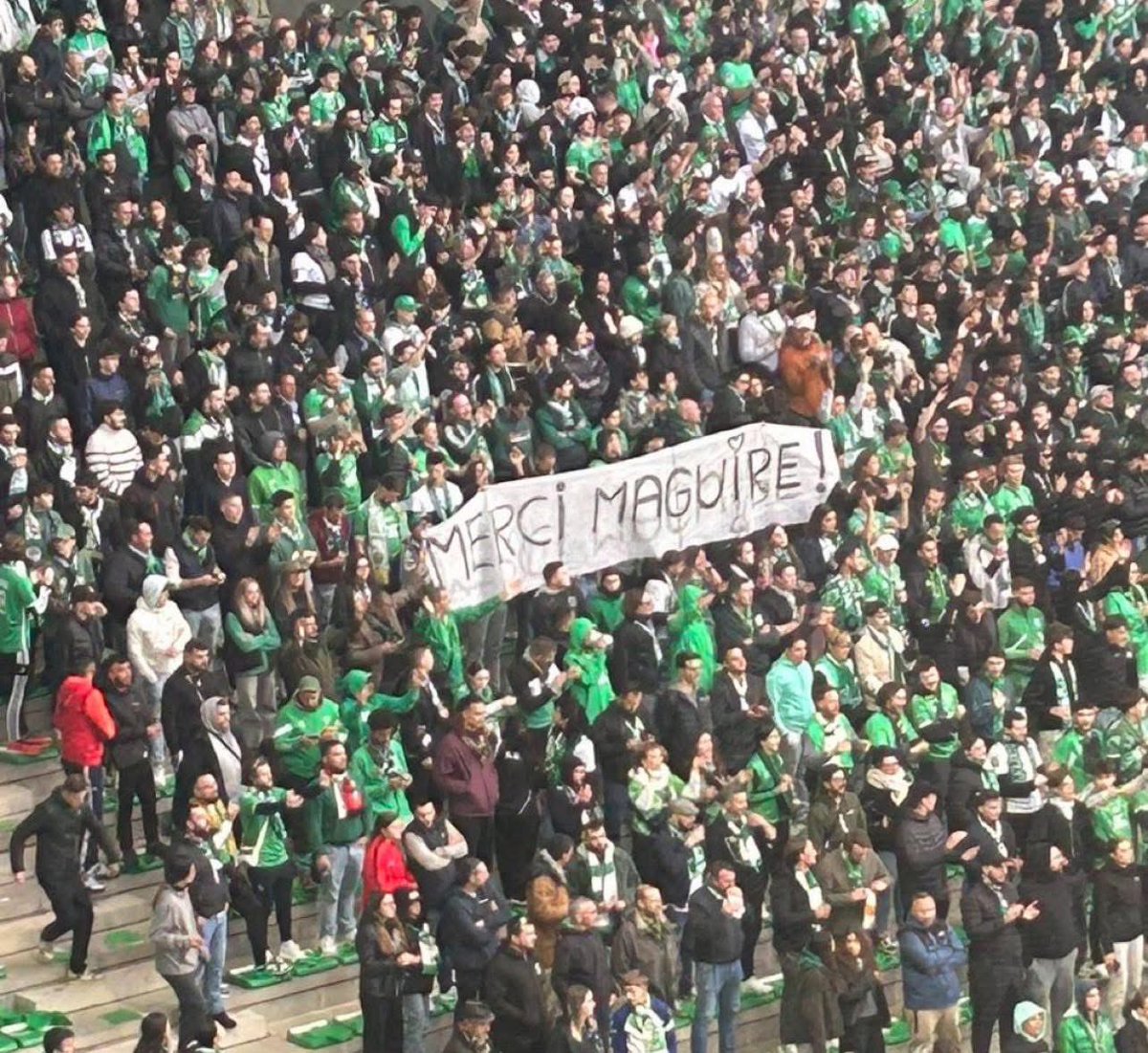 Saint-Étienne supporters with "Merci Maguire" signs at their derby match against Lyon today 😂