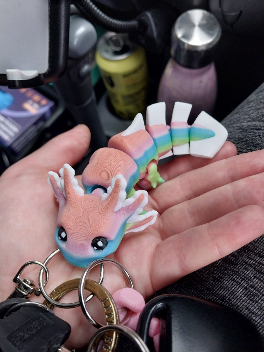 Huntaway_x's tweet photo. I am soooo infatuated with these 2 key chains! The axolotl from #Armageddon. Too cute! https://t.co/zu2Keo0eOd