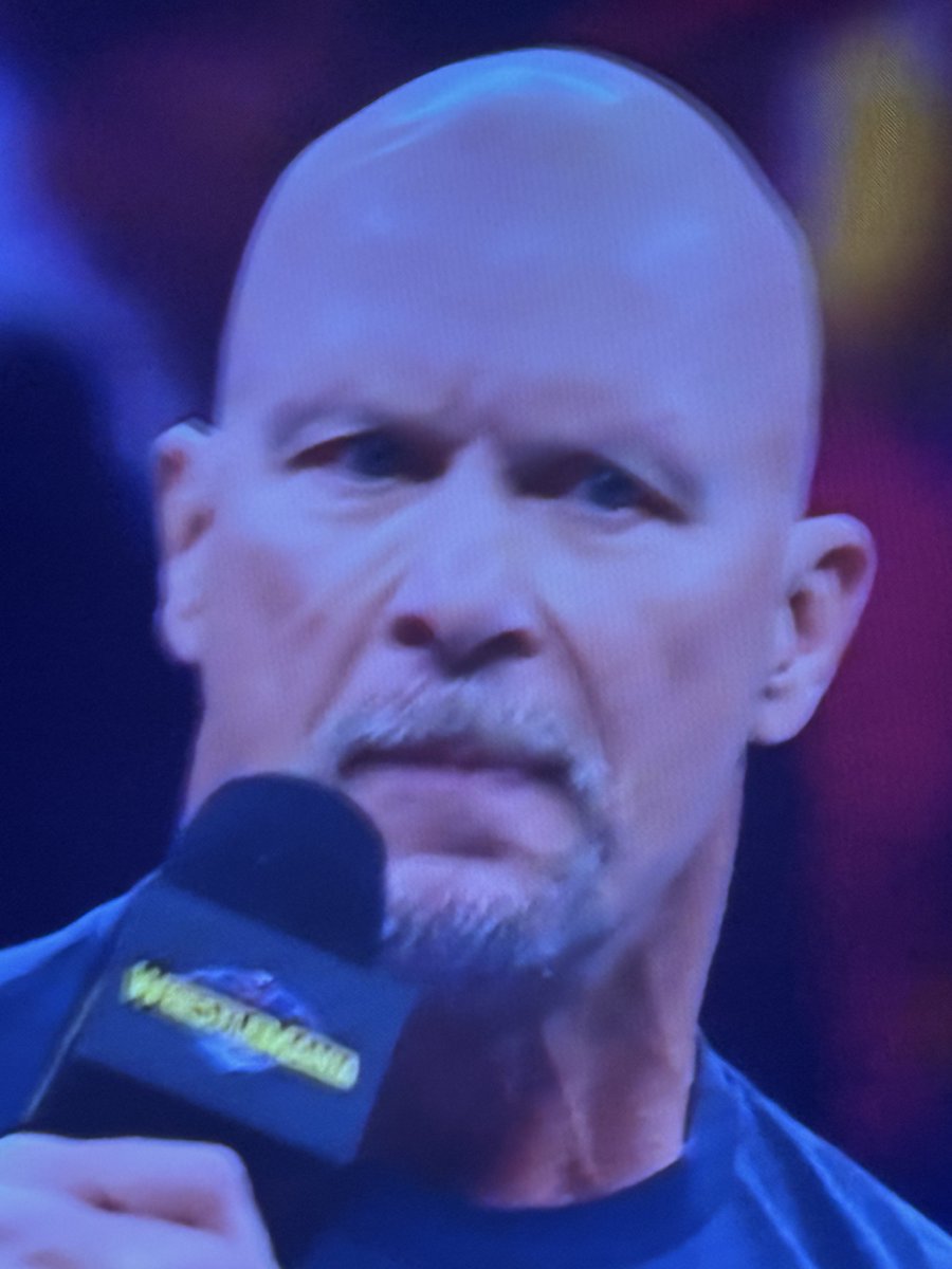 Hey, that’s <a href="/steveaustinBSR/">Steve Austin</a> at Wrestlemania.