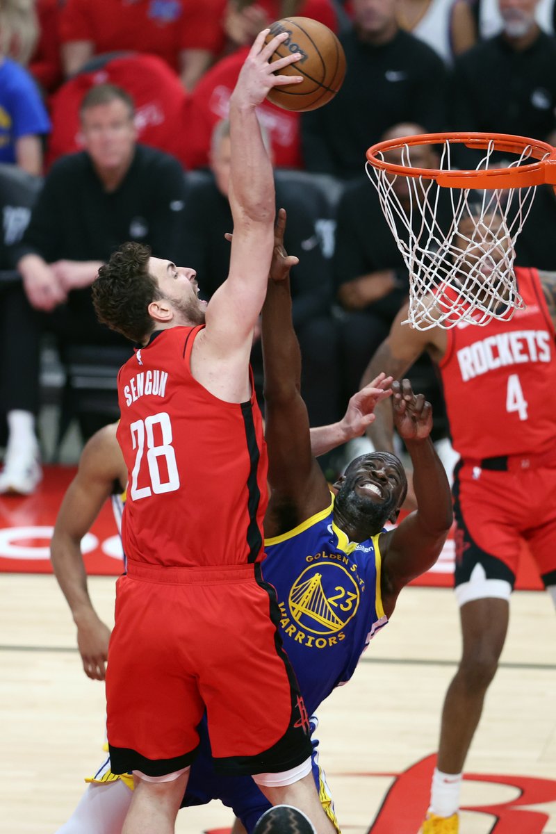 ScottStrazzante's tweet photo. Houston Rockets’ Alperen Sengun dunks on Golden State Warriors’ Draymond Green in 1st quarter during Game 1 of First Round of NBA Playoffs at Toyota Center in Houston. @sfchronicle photo by @ScottStrazzante https://t.co/j2OOMGdkrS
