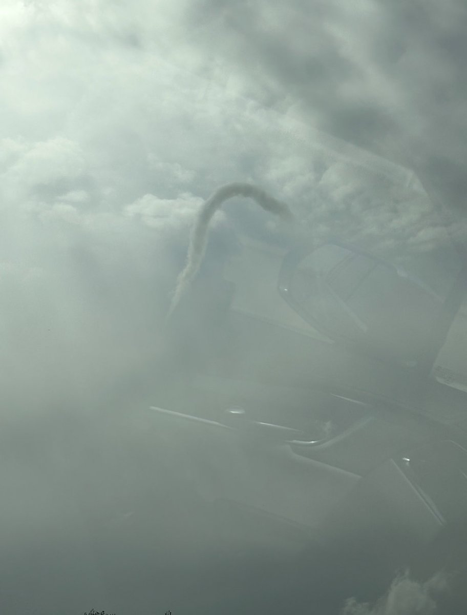 Does anyone have any idea what this is in the sky? My son took this from the car today on the way to celebrate Easter. The weather was perfect at the time.