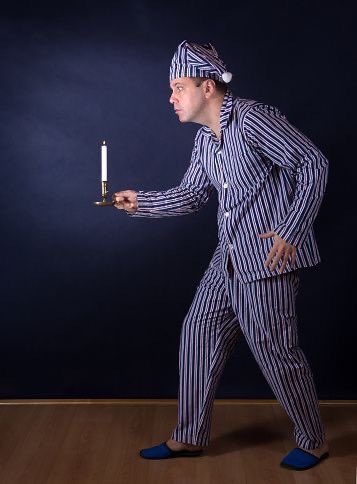 walking around my house with no lights on at 2 am with a sandwich on a plate like