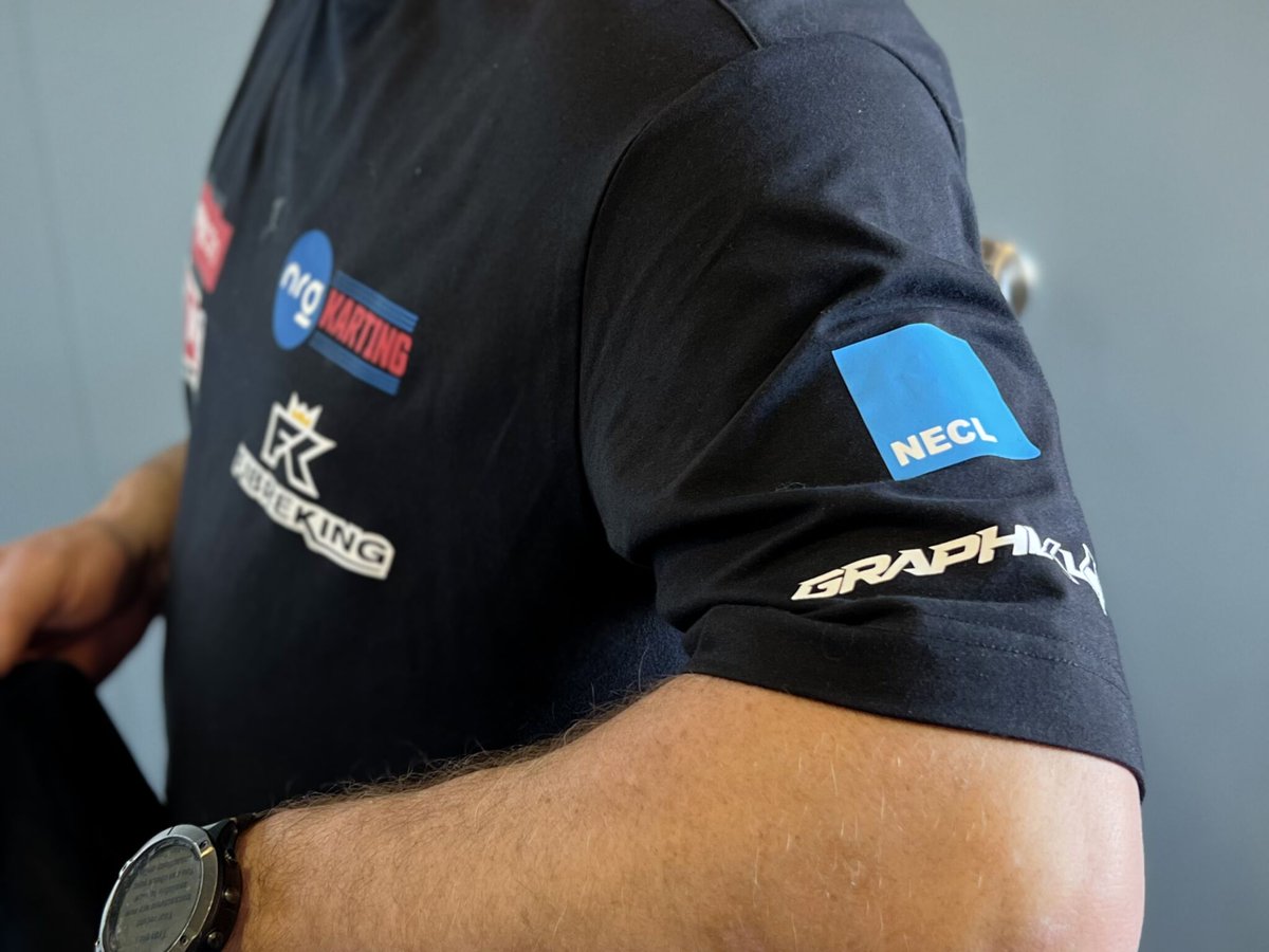 For this week's #MarketingMonday, the spotlight is on... ourselves! 

Our fabulous client, teen racing star Gracie Mitchell, has our branding on her 2025 race gear. (Here modelled by her dad, Mark!). 

#NECLConsulting #GracieMitchellRacing #DigitalMarketing