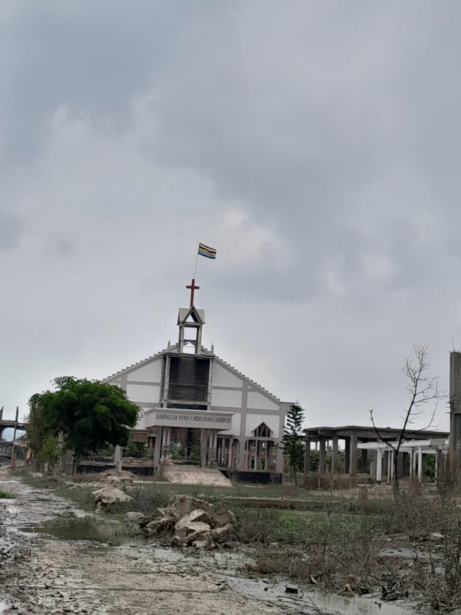 DynastyDoungel's tweet photo. Dear Dr. Bimol Akoijam @Bimol_Akoijam, Hon'ble MP. 
With due respect, you mentioned constitutional and fundamental issues regarding Thangting Hills the other day. Kindly go through this picture of Khongsai Veng Church, located in Imphal. The Constitution of India guarantees protection of religious places' sanctity. However, Meitei terrorist organizations like Arambai Tenggol have used them to display their flags, violating that sanctity. If you're seriously looking for peace, you should mention this in the public domain and question why @manipur_police still allows them to do so.