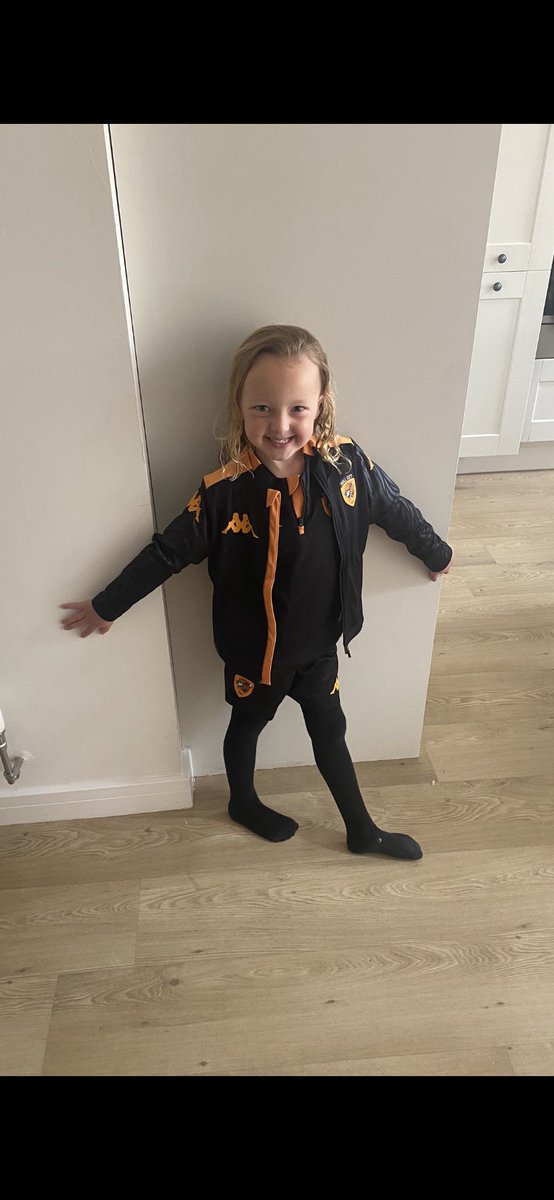 NickBiggs1's tweet photo. She’s super excited to back the boys today!! Just don’t let her down again with a slow, half arsed performance! UTT! 🙏🐯🐯 #hcafc https://t.co/ZPN69DsVn4