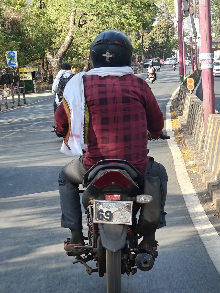DevKumarSharma0's tweet photo. Pura number plate gayab, par '69' chhod gaya...
Bhai ne clearly likhwa diya - Life mein rules nahi, sirf positions matter karte hain.
#SavageAF #DesiDarkHumor https://t.co/7b33RMmaOB