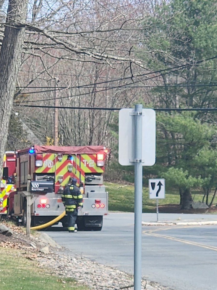 Fire fighters filling tankers from nearby hydrants on Read Ave in Seekonk, MA. Fire on Emily Way.