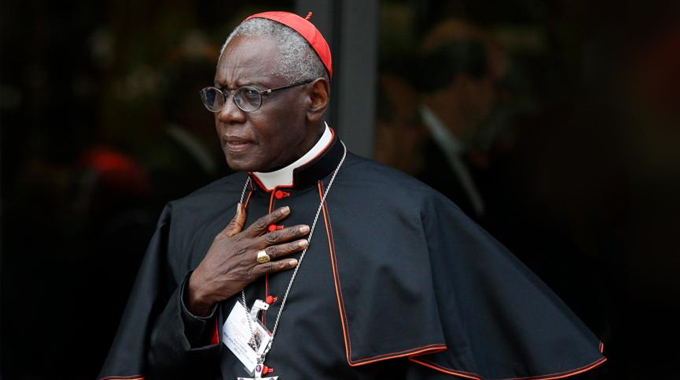 altrightvenus's tweet photo. Robert Sarah, el cardenal guineano de 79 años que podría ser el nuevo Papa negro, denunció la Agenda 2030, el aborto, la ideología de género woke, el socialismo y la migración masiva como armas del globalismo para reemplazar a Dios con una tecnocracia secular anticristiana. https://t.co/hlzTrQPC5o
