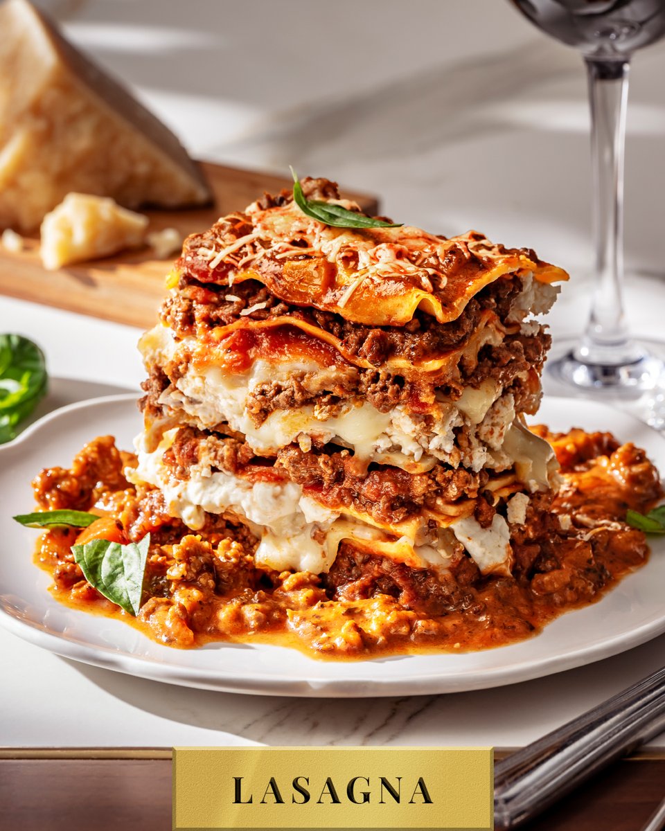 Our latest work of art: a thirty-layer lasagna, artfully crafted with Bolognese, Italian sausage, herb-ricotta, and tomato ragu. The taste measures up to the craving.