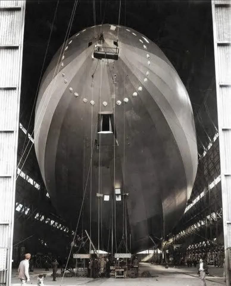 Atherstone and Tim the dog bottom left of the image. Airship R101.