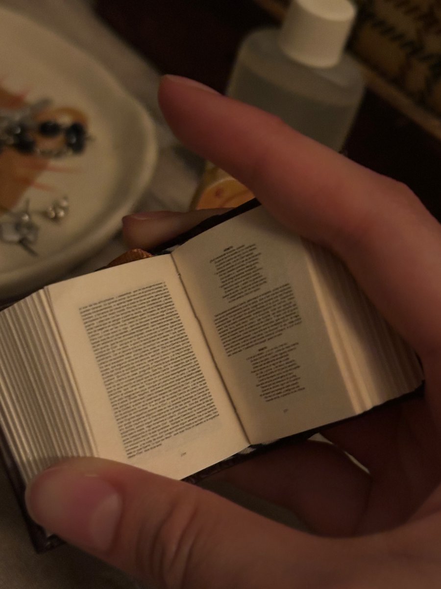 boobpogo's tweet image. how my mom left my nightstand #protected. The book is a miniature don quixote tho not a bible