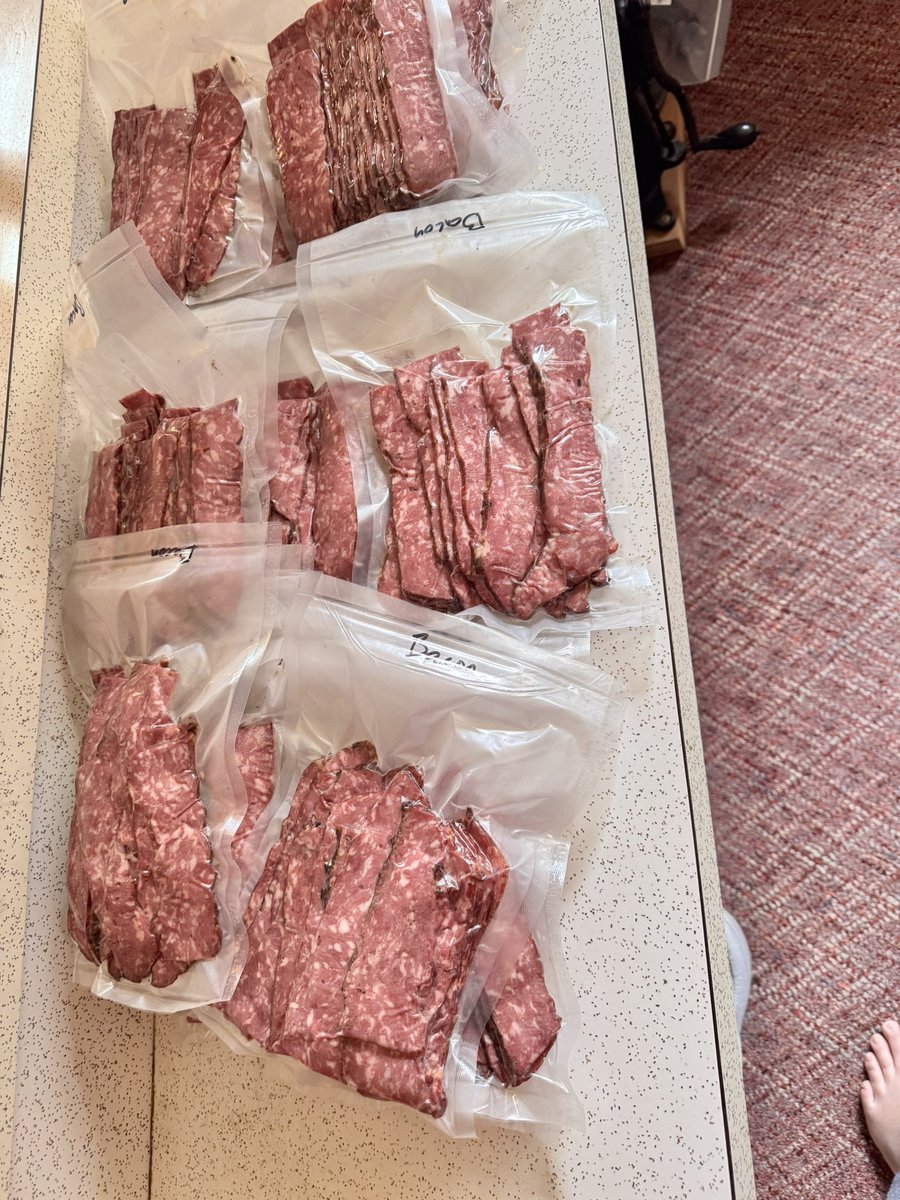Jimbean32Olson's tweet photo. 25 lbs of venison bacon smoked, sliced and vacuum packed!! Should last til fall! https://t.co/x5CP222M3S