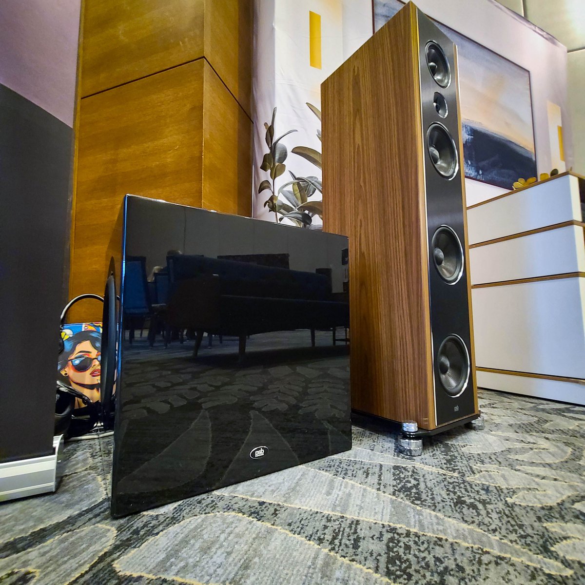 IsoAcoustics's tweet photo. This PSB Synchrony T8 (right) at @Axpona obviously has our GAIA isolation footers underneath, but did you know the Subseries BP12 subwoofer also has them discretely underneath? One of our favorite stealthy implementations from an OEM partner! #AudioIsolation #HiFiSpeakers https://t.co/6JIeosIKRJ
