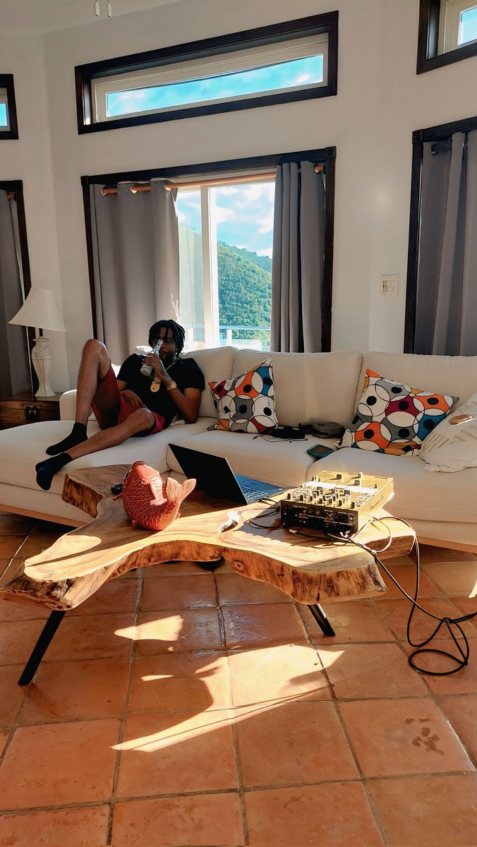 Ina villa with the speakers loud