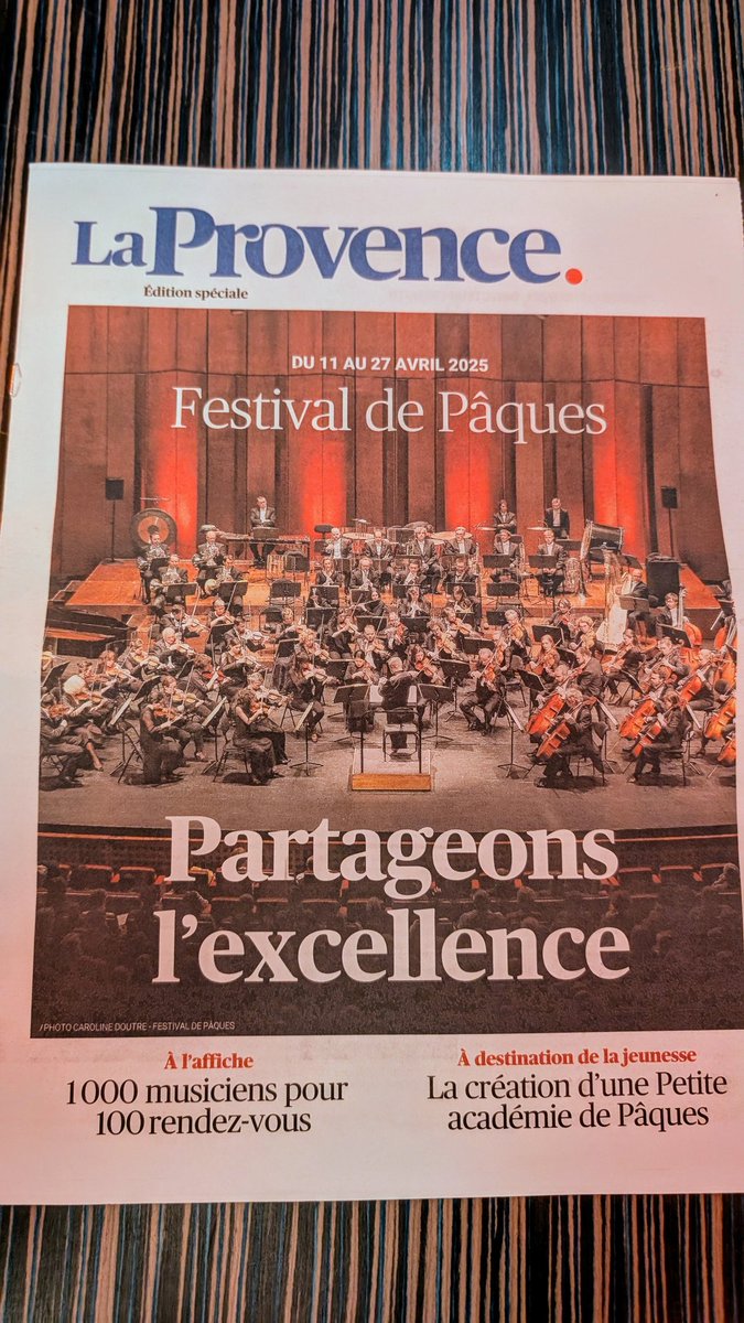 Here's something to shame the clowns at Arts Council England. This headline translates as 'Let's share excellence'.

Now there's a slogan.