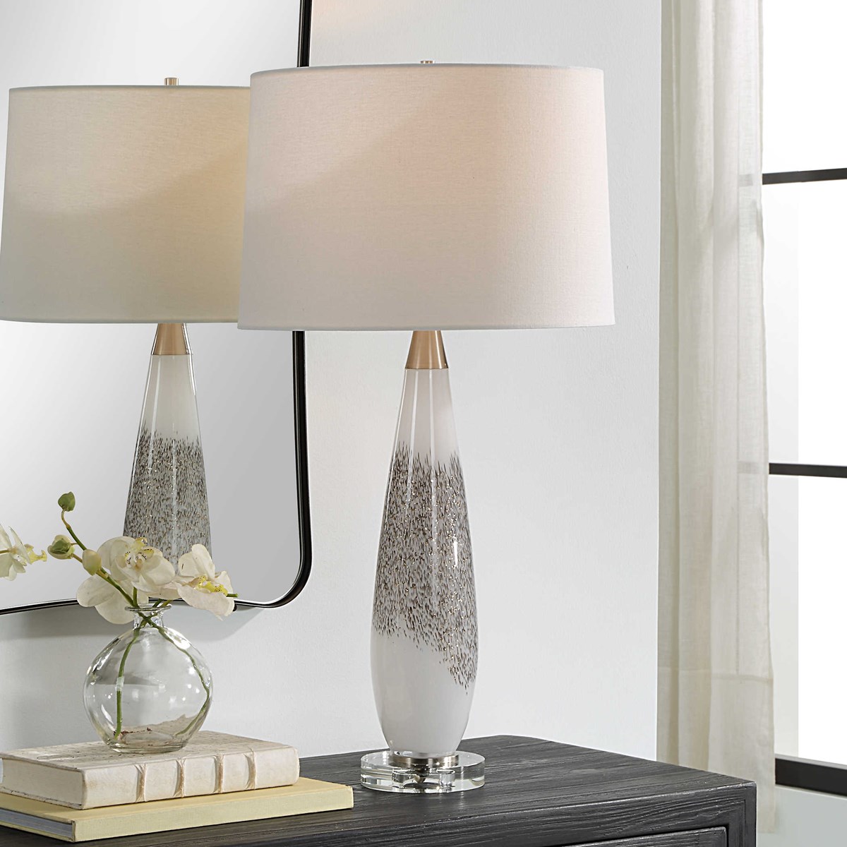 Shop online <a href="/1STOPlighting/">1STOPlighting</a> for the latest #carolynkinder designs. You'll love the metallic silver details paired with a thick crystal foot and plated brushed nickel accents on this slender beauty. 1stoplighting.com/search.aspx?se… #interiordesign #homedecor #uttermost