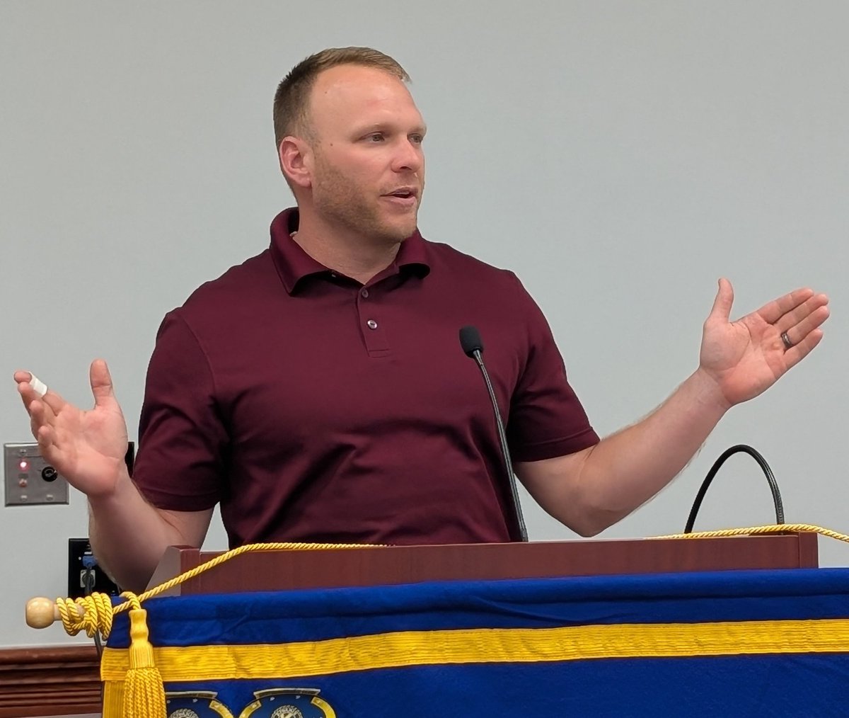 NHS Assistant Principal Baron Smith speaks to Newark Kiwanis today about starting the Community Clean-Up Day and inspiring students to take pride in their community.