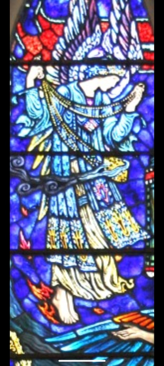 Anyone to help w a glass problem? This is #KarlParsons at #Saintfield. Who is the character in green? His legend says 'Never was in his heart but pity, peace and mercy' which is v similar to a line from William Blake. Also, why does the top left angel have waves? Thank you.