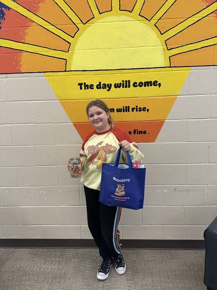 THE BIG WINNER

Congratulations to Layla Litteral! Layla was the big winner during our recent book fair. She guessed the correct number of "bookworms" in the jar and was treated to some sweet prizes!

Congratulations, Layla!