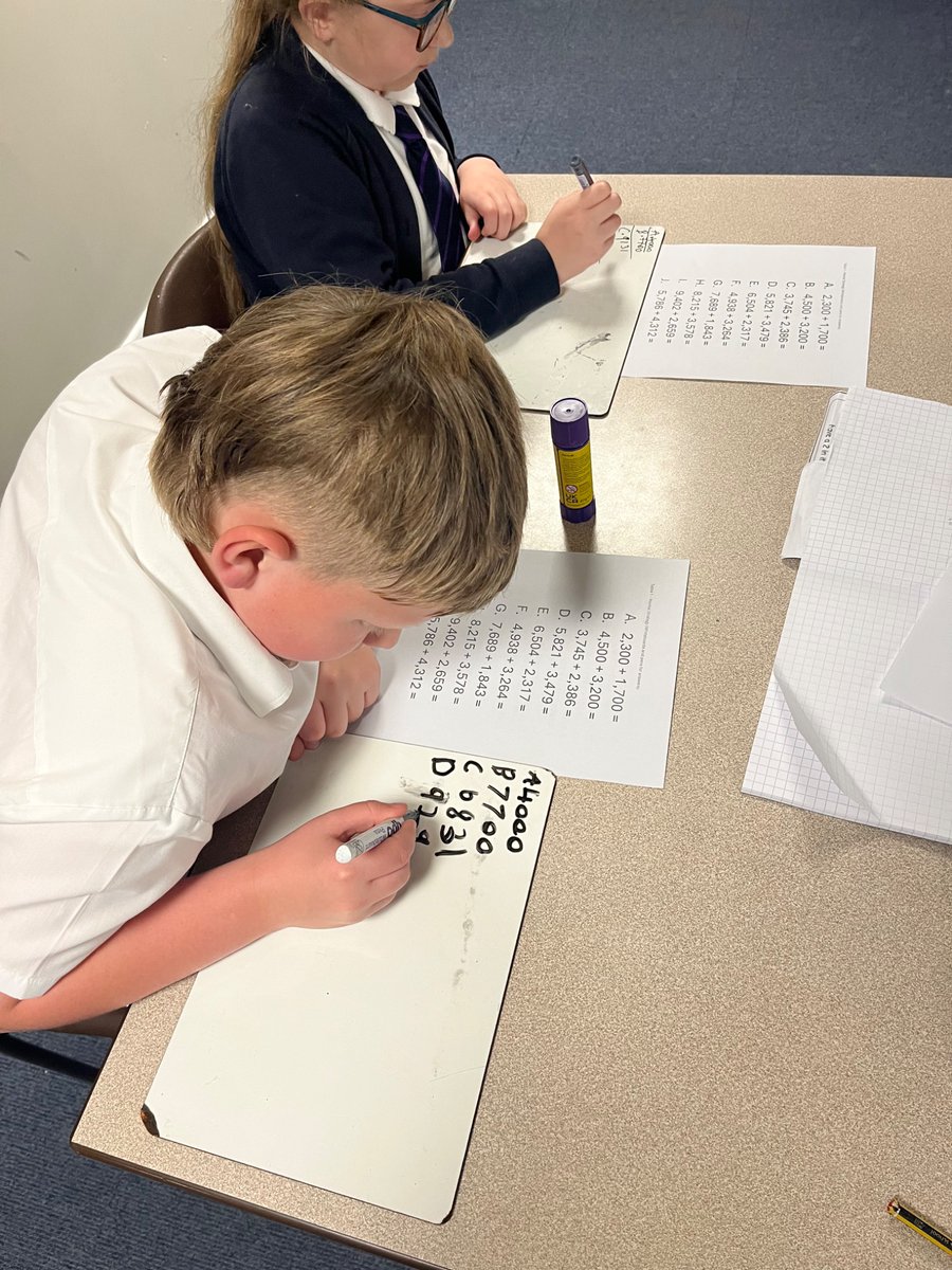 MissPSymons's tweet photo. Using different strategies to add two four-digit numbers. #TheMillMaths https://t.co/b4KlfH3e3Z