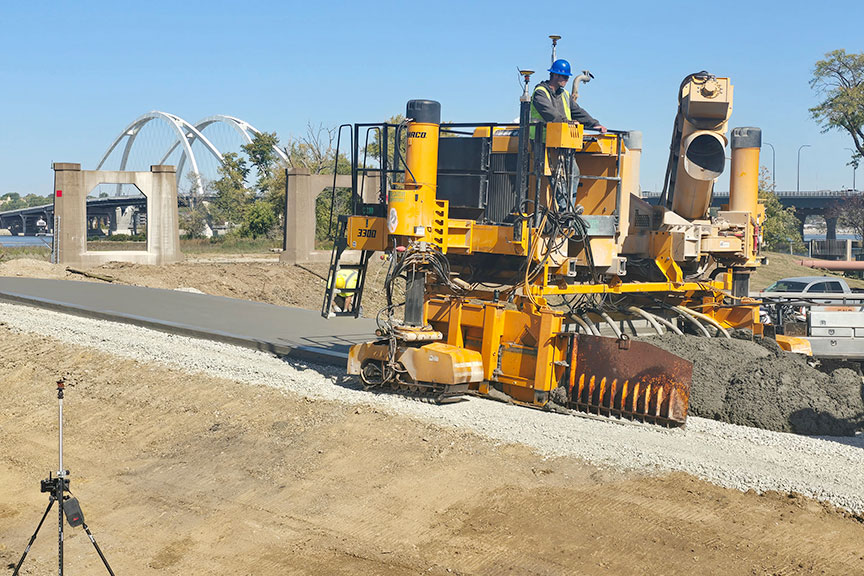 This GOMACO 3300 set up for transverse paving is slipforming a bicycle path 12 feet (3.7 m) wide and six inches (152 mm) thick with Leica 1UP 3D guidance in Moline, Illinois.

📸Photos By Adam Ward, GOMACO Corporation

#GOMACO #PaveWithPride #Concrete #ConcretePaving