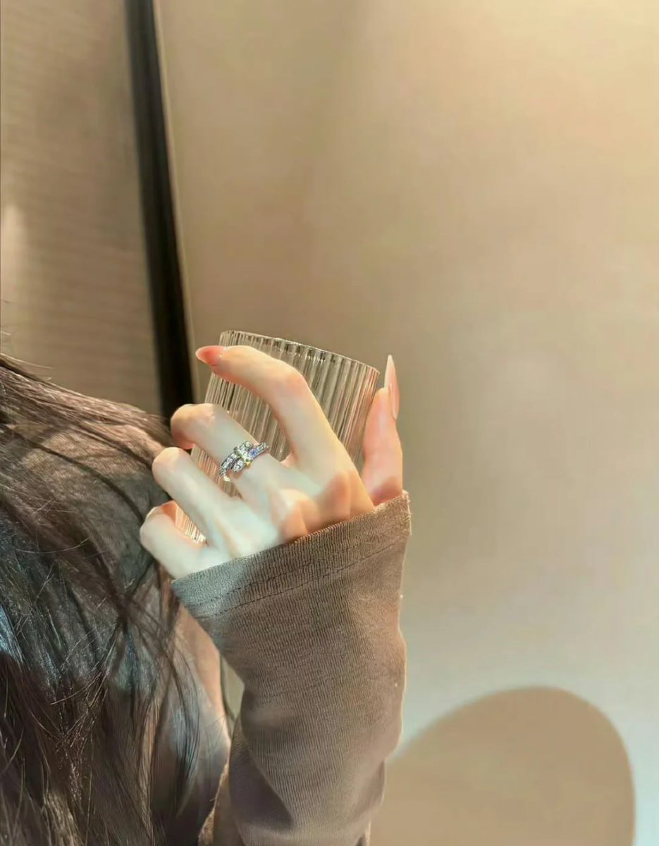 Golden hour glow, pretty ring, and a sip of something sweet.✨