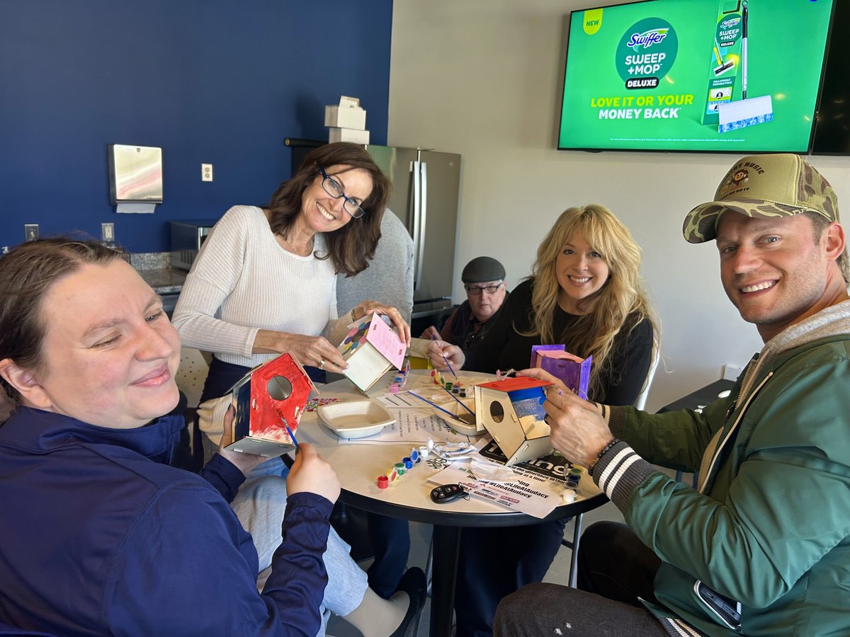 1043WOMC's tweet photo. JoAnne, Rob and Holly joined the crew painting bird houses today at Audacy Detroit! What are you doing for #EarthDay? 

#1Day1Thing #LifeAtAudacy @JoAnnePurtan https://t.co/DE41lAhp6d