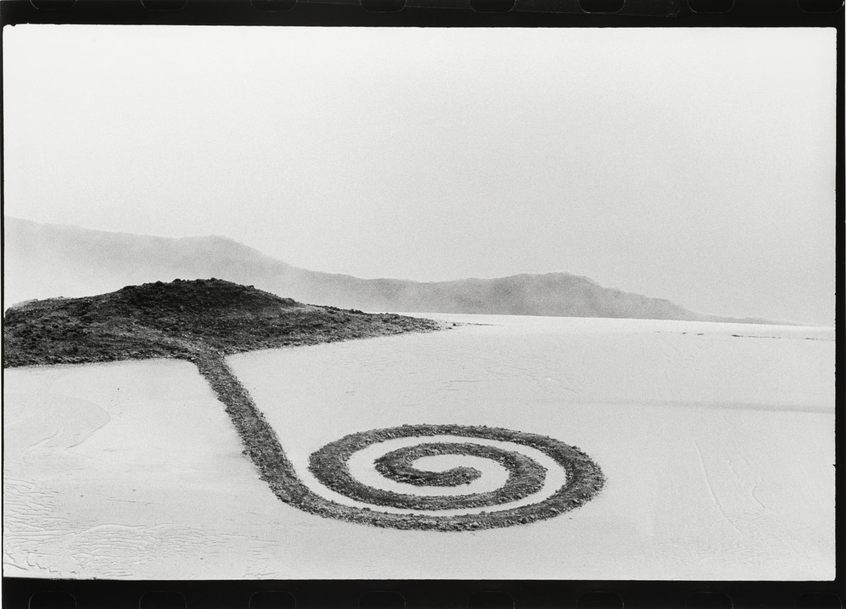 Celebrate Earth Day with Vik Muniz's photograph of Robert Smithson's Spiral Jetty. 🌀

Smithson created the work in 1970 in Utah's Great Salt Lake using 6,650 tons of black basalt rock and earth, resulting in a 1,500-foot-long and 15-foot-wide sculpture. "The scale of the Spiral
