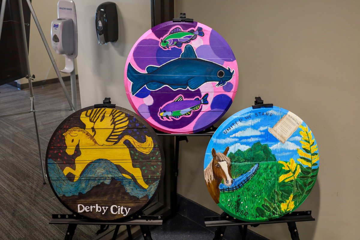Student art was set up today at the KDE office by the elevators on the 4th and 5th floors! Kentucky students created paintings on bourbon barrels, each one representing the region they live in.

The art was recently shown at the KY Art Education Association National Convention.